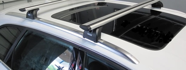 Thule roofbars fitted to a car with flush roof rails